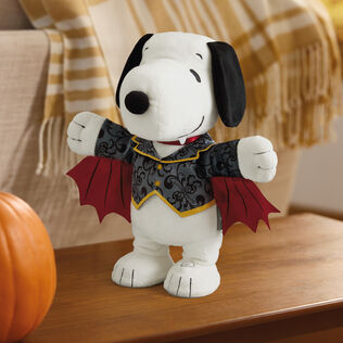 A Snoopy vampire stuffed animal