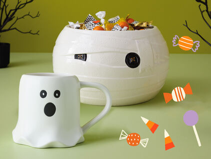 A mummy candy bowl and a ghost mug.